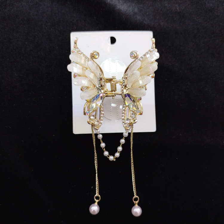 گیره مو مجلسی طرح پروانه مروارید دار مدل 01